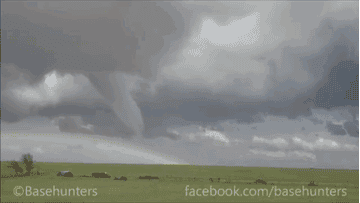 This Picture Of A Tornado Hitting A Rainbow Looks Like It S Straight Out Of Oz