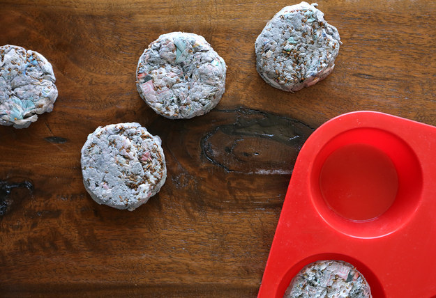 Use muffin tins and newspaper to make seed bombs.