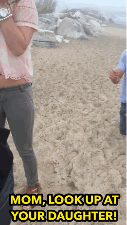 Bridgett told BuzzFeed, "We waited seven years for him to propose and my mom didn't even get to see it since she was face-down in the sand. Good thing we had this video for her too see!"