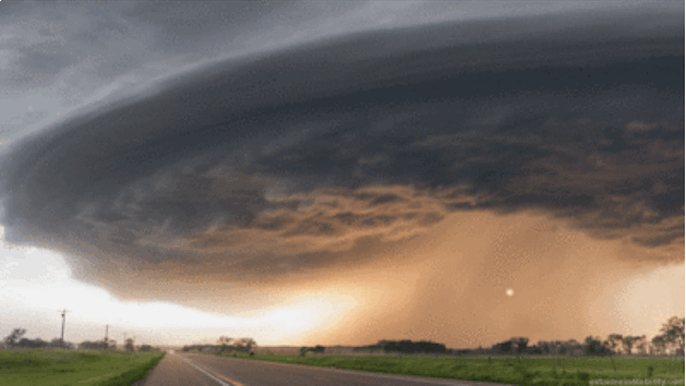 "It is really rotating and getting rather crazy looking. You could hear a constant roll of thunder as it approached but never really see any lightning. The sun was really back-lighting this storm now. The more direct back-lighting you get the more it makes clouds look black," Hollinghead described one of the storms.