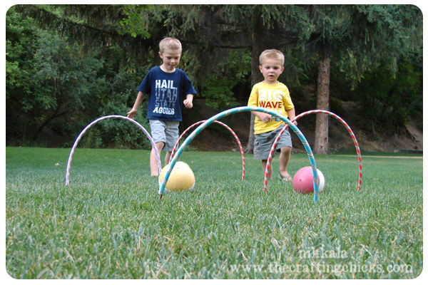 Hula hoops can also be used to make this kid-friendly croquet game.