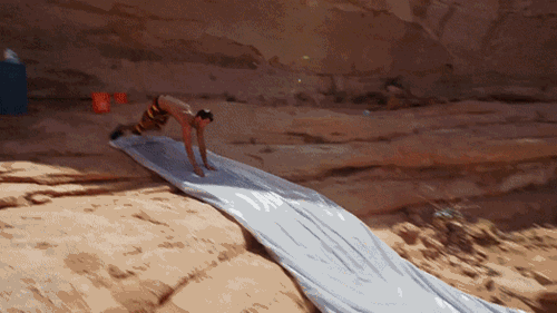 They could've gone classic cliff diving. Instead they got the tarp out with some dish washing liquid.