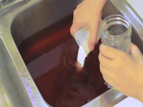 Fill the basin to a shallow level, add half a cup of baking soda, then a full cup of vinegar. Wait until it stops foaming, rinse, and then you're done!