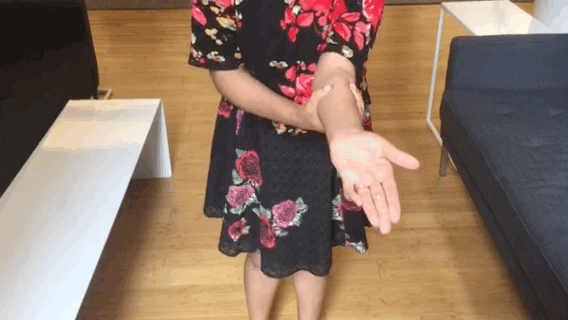 This move feels good pain or no pain, but if you work with your hands a lot, whether typing all day at a computer or doing manual labor, it's a lifesaver. Here's how to do it:1. Hold your arm out, palm up, and cup it just under the elbow with your opposite hand. 2. Flip your arm within you grip so your palm faces the ground. 3. Repeat all down your arm until you reach your wrist. Don't squeeze too hard. Per Silbar: