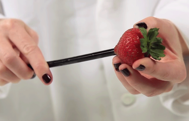 Ever feel like you spend more time picking bits off strawberries than you do actually eating them? Save yourself the fuss by using a straw to simply poke through and push out the stems.
