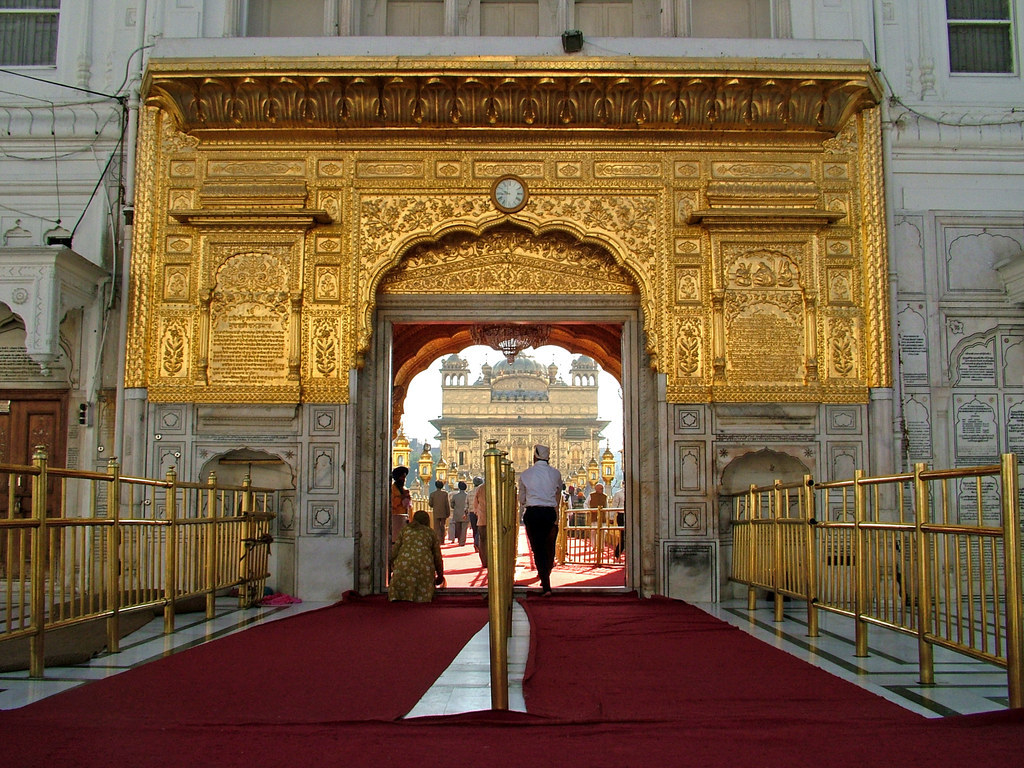 Worshippers enter the Golden Temple, Harmandir Sahib Gurudwara.