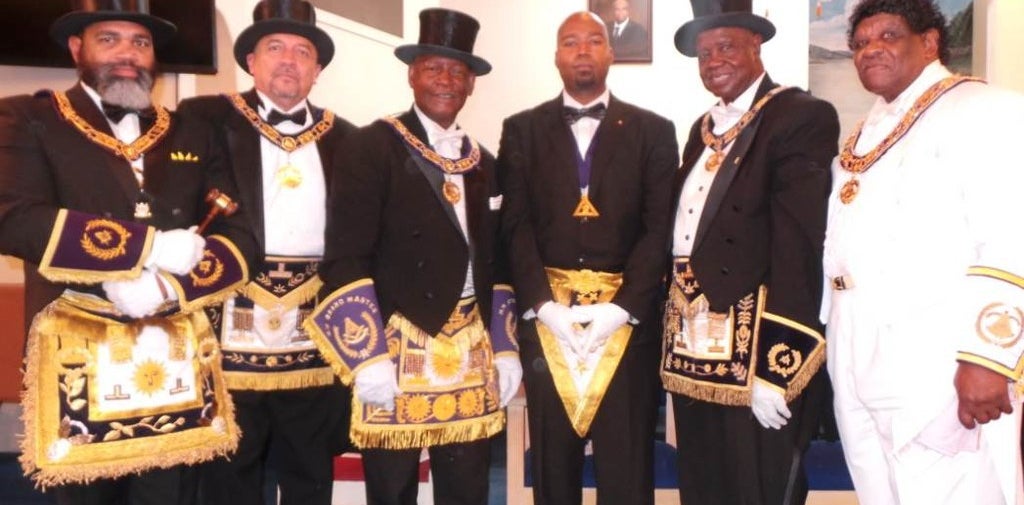Henry, left, and Kiel, third from right, at a Masonic event.