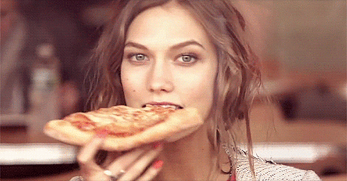 The pizza boxes and leftover dough crust give it away.