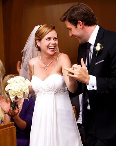 Pam wears simply gorgeous dress and remains perfect.