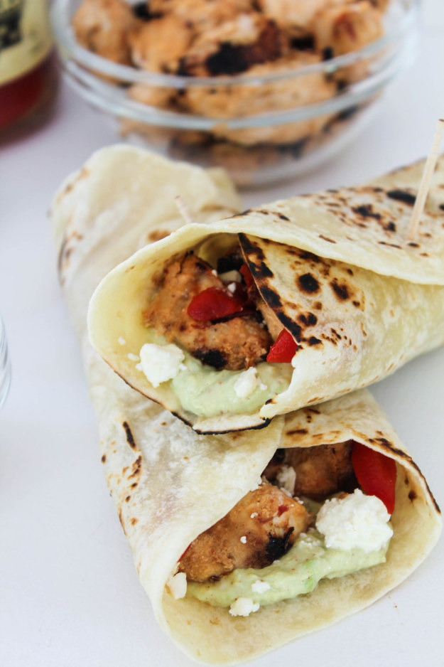 Harissa Chicken Wraps with Roasted Peppers, Feta, and Avocado Aioli