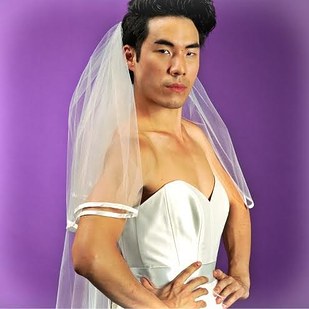 men trying on wedding dresses