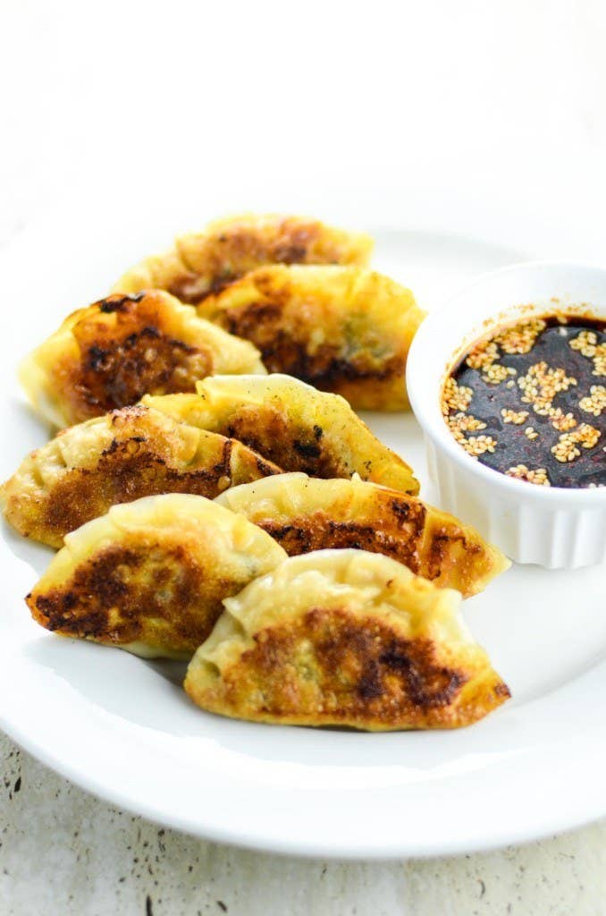 These are the pan-fried potstickers that usually come to mind when you're craving dumplings.Country: JapanTypical Filling: Pork, mushrooms, and cabbage.Recipe: Pan-Fried Chili Pork & Cabbage Gyoza