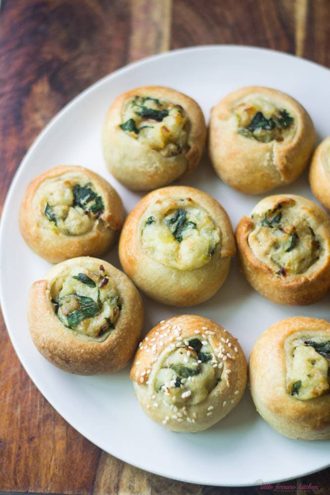 Heavy on the dough and potato, these little balls of joy are carb heaven.Region: Eastern EuropeTypical Filling: Potato and veggies.Recipe: Mini Potato & Chard Knishes