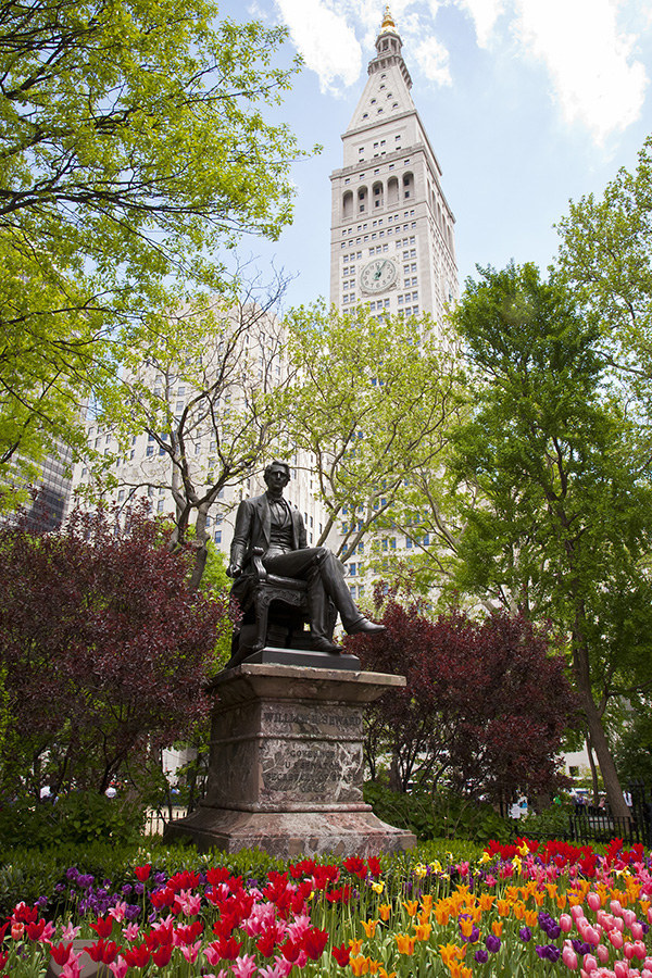 Madison Square Park is filled with exotic flowers each summer. It's also a great place to catch a peek of the Empire State Building to the north!