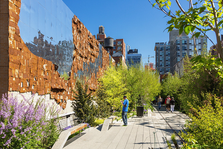The High Line is a public park built on what was once a freight rail line elevated above the streets of the west side of Manhattan. You can still see the train tracks in certain parts of the park!