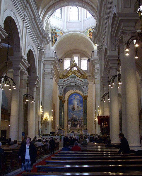 Santuario di Nostra Signora di Bonaria or Sanctuary of Our Lady of Bonaria is a beautiful cathedral located in Cagliari. The stunning building is on top of a hill and has stairs flowing down to the street below.