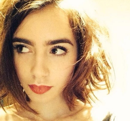 Nobody rocks bold eyebrows and large, dark eyes like Lily.
