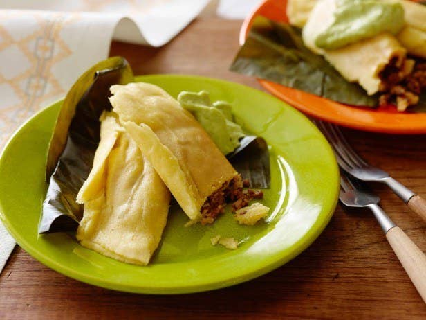 These soft cornmeal roll-ups are not unlike tamales, baked in banana leaves and filled with deliciously spiced meat.Country: Trinidad and TobagoTypical Filling: Beef, pork, and/or veggies.Recipe: Cornmeal & Meat Pastelles