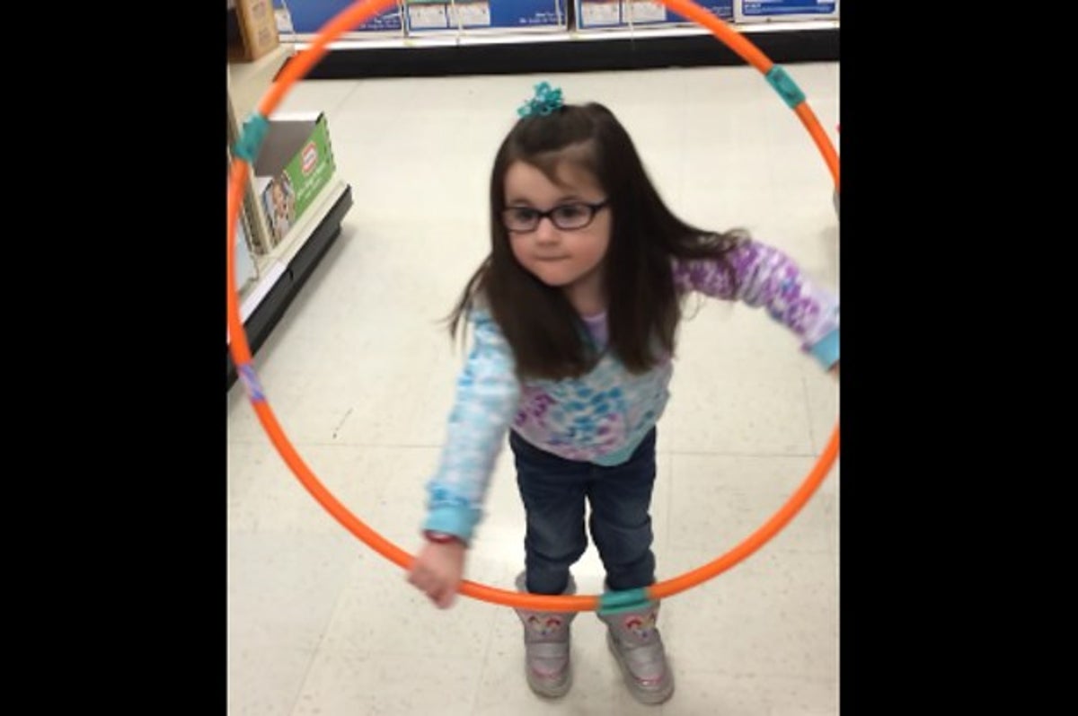 This Adorable Girl Trying To Hula Hoop Failed So Hard She Won