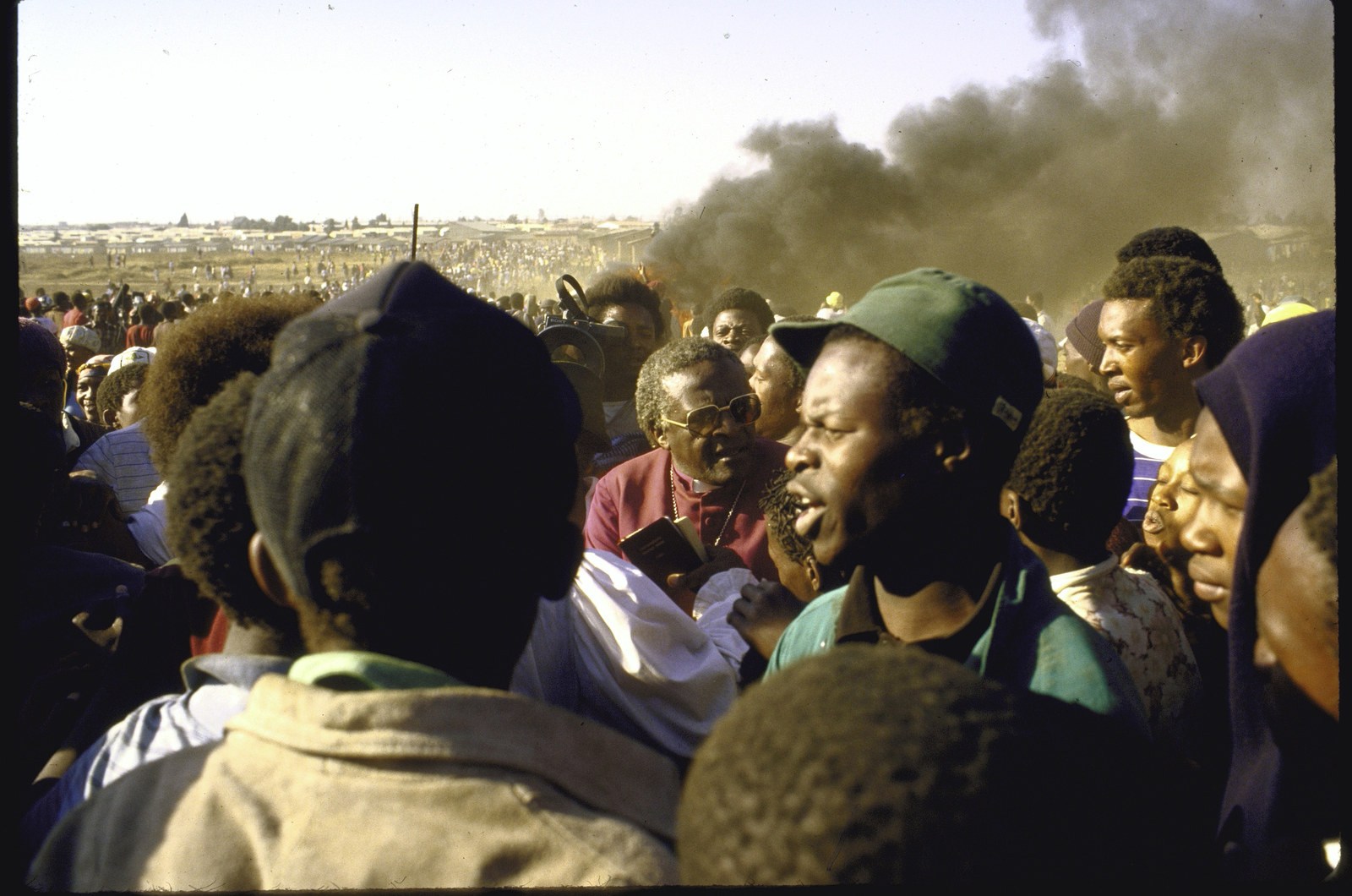 Tutu amid a crowd of people