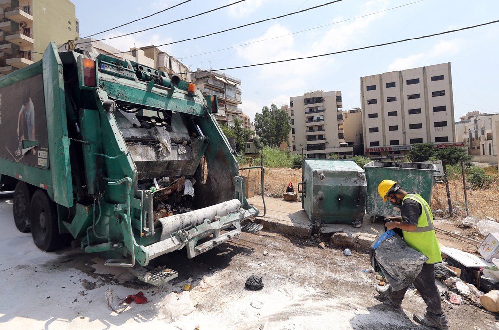 Garbage Collectors Treated Like Rock Stars As Trash PickUp Resumes In