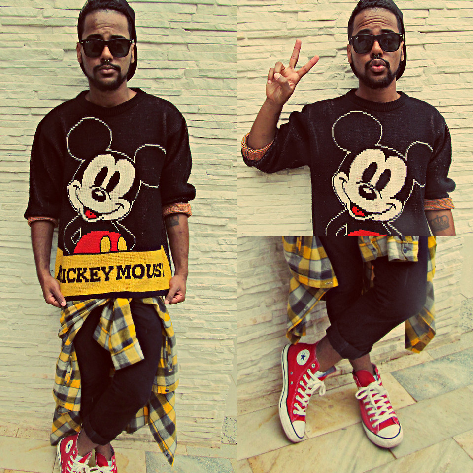 Camisa xadrez amarrada na cintura, um tênis clássico, é uma ótima roupa para ambientes descolados que lidam bem com a Disney (como deveria ser em qualquer lugar!).