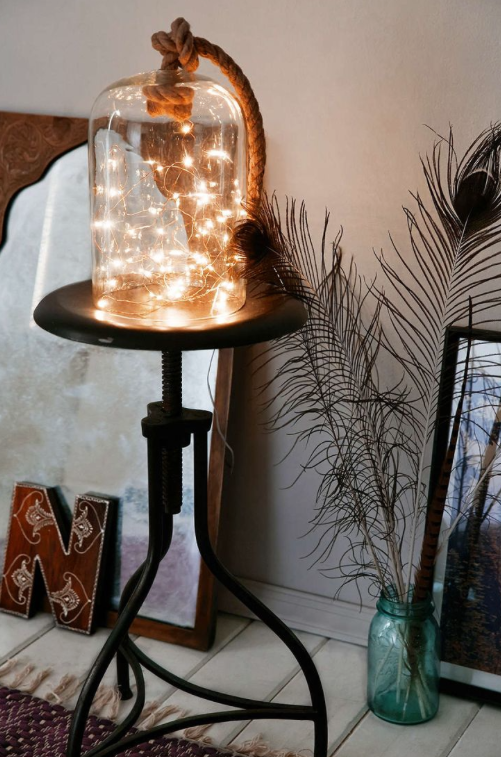 Put a battery-powered strand in a bell jar for an artsy DIY light.