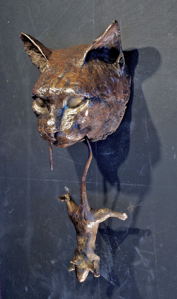 Let the neighbors in on your cat obsession with this door knocker, which will cost you $1,250.