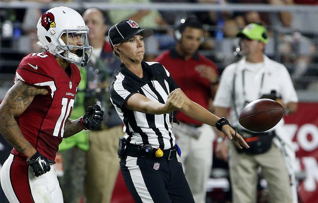 NFL's first female coach and first female on-field official take a moment  for a history-making photo at preseason game