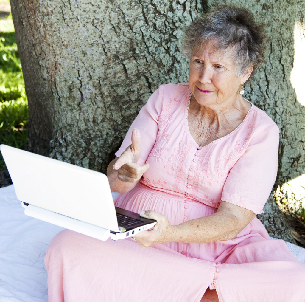 old lady shooting the computer screen