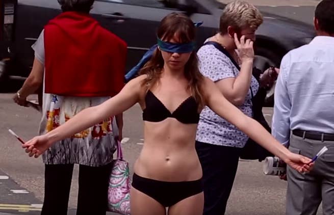 A Woman Undressed To Her Underwear In Public To Encourage Body