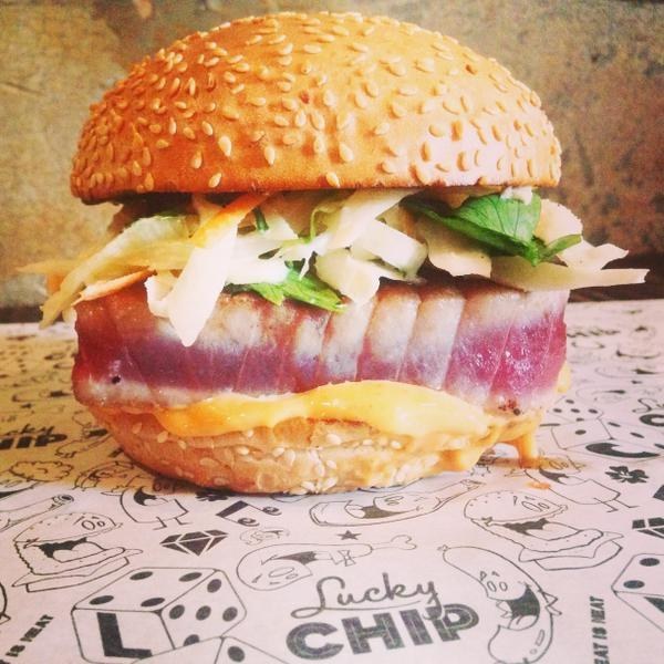 Tired of red meat? Go under the sea with Lucky Chip's Jacques Cousteau burger. Featuring Ahi tuna, summer coleslaw, Sriracha, and Yuzu mayo, it packs a punch.