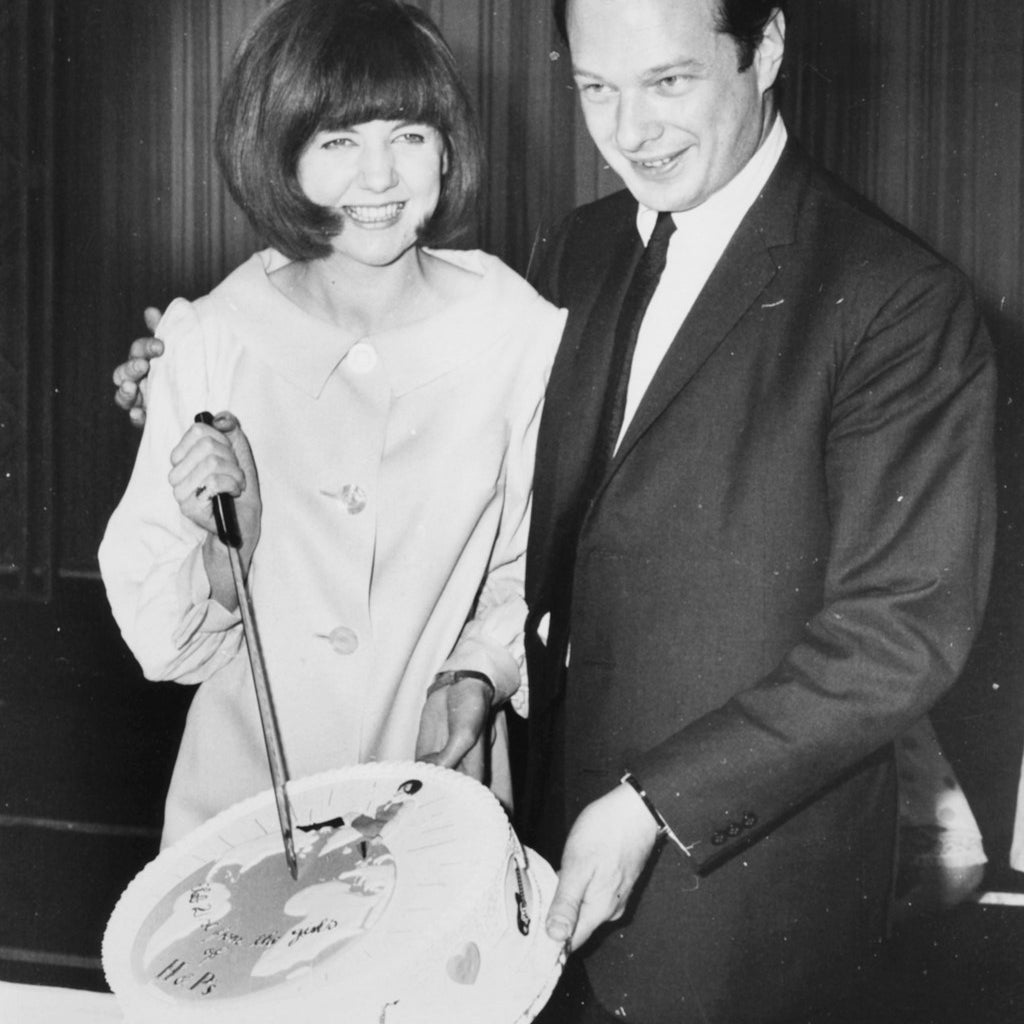 With Brian Epstein in 1964