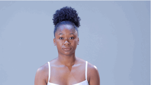 • Smooth hair up and back.• Secure hair using a soft hair tie. Then fluff and volumize the remaining curls into a pouf-shape.• Finish with hairspray.