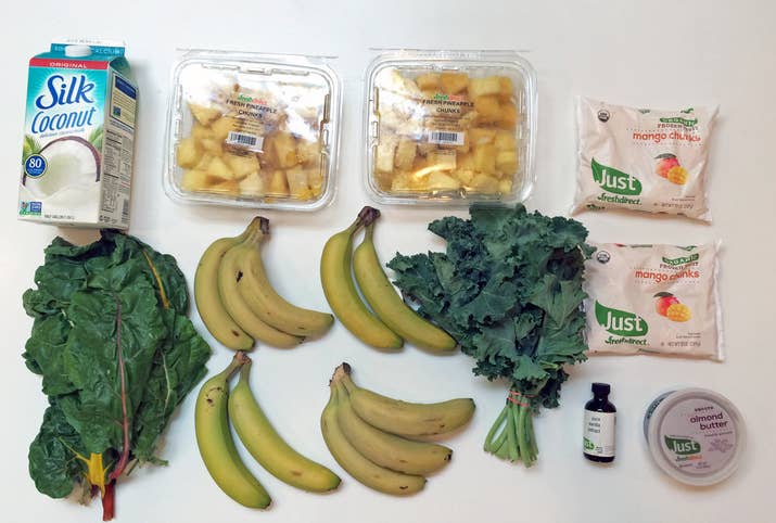 Just take your favorite recipe, and multiply the ingredients as necessary. My personal go-to is pineapple, mango, greens, almond butter, and coconut milk. (Full recipe at the bottom of this post!) Or, if you hate eating the same thing day in and day out, pick up a variety of ingredients so you can mix and match.