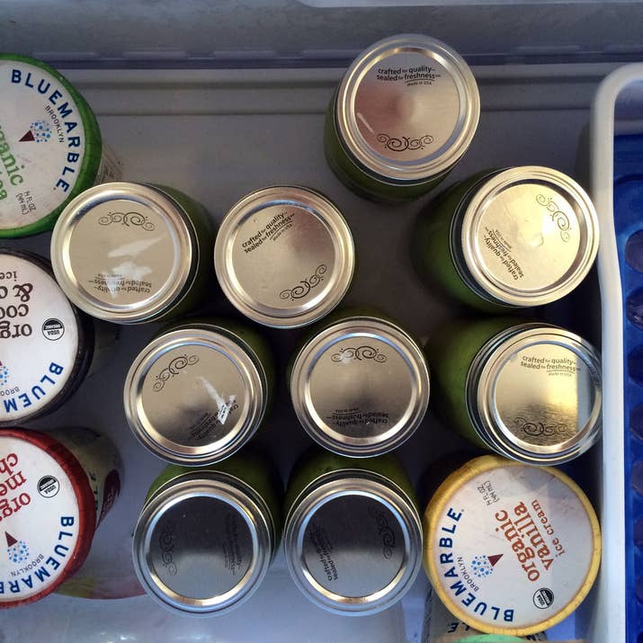 With their lids on, to prevent spills. (Yes, ok, I eat a lot of ice cream.)