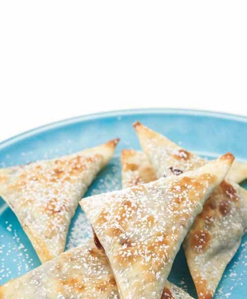 Nutella and banana cuddled together into little crispy pockets of nom? It’s the sweetest love story there ever was. 1⁄2 cup Nutella16 wonton skins1 banana, sliced into 15 thin roundsOlive oil or nonstick cooking sprayConfectioner's sugar (optional)Preheat the oven to 375°F. Place 1/2 tablespoon of Nutella into the center of each wonton skin. Put a banana slice on the Nutella. Dip your finger in some water, run it along the edge of the skin, and fold the skin in half, pressing to seal. Arrange the prepared ravioli on a greased baking sheet. Brush the ravioli with olive oil. Bake until the skins are crispy and golden brown, 8 to 10 minutes. Let cool slightly, then serve. If desired, dust the ravioli with confectioner's sugar just before serving.