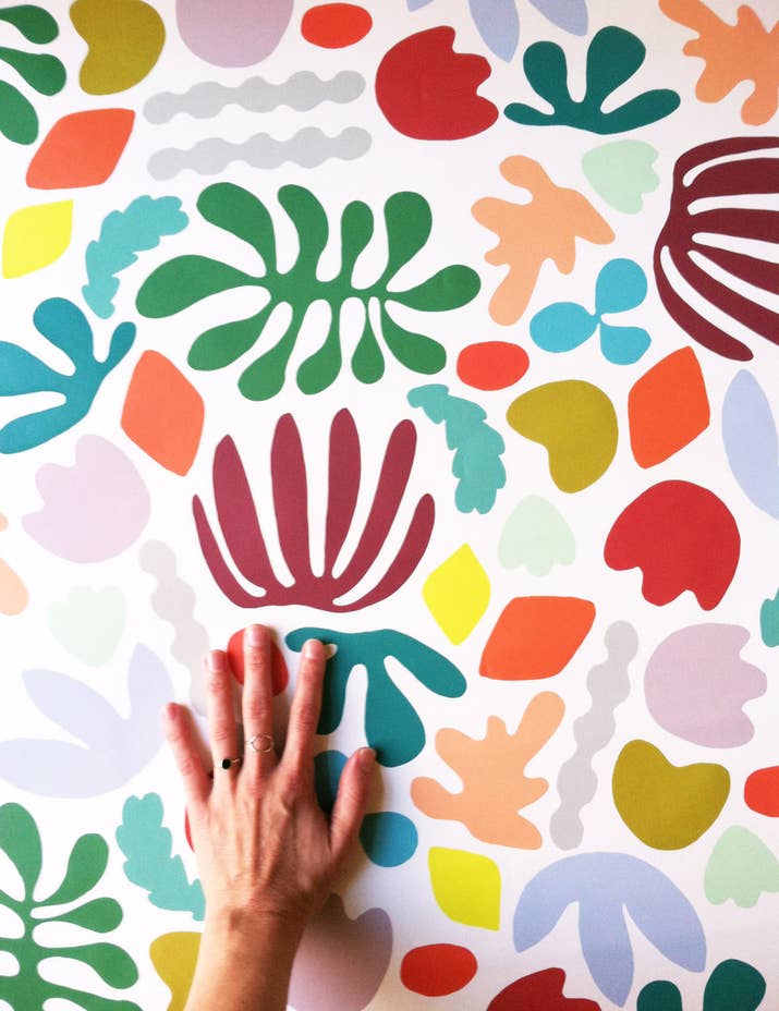 These wallpaper strips are removable and reusable. Get it here.