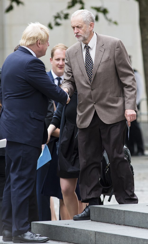 Boris Johnson shakes hands with Jeremy Corbyn at a memorial service in July 2015 for the victims of the 7/7 London attacks.