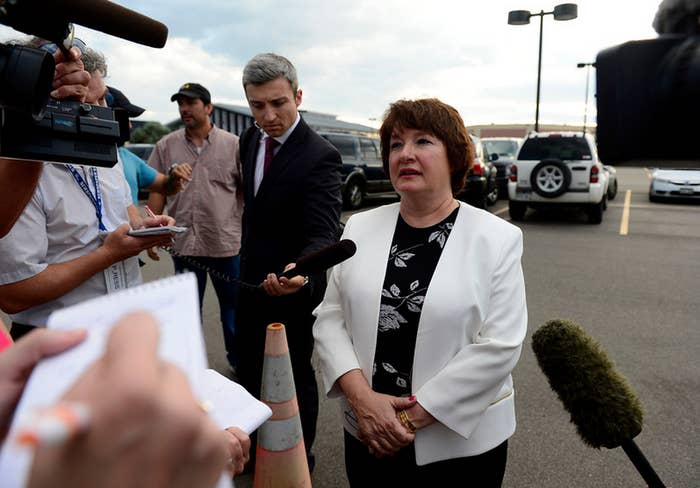 A juror who only wanted to be identified as "Juror 17" talks with the media in the parking lot of the courthouse after the conclusion of the trial.