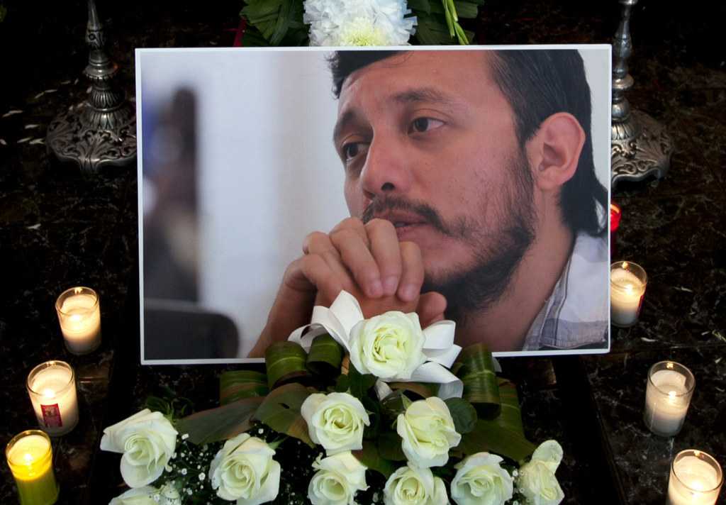 A photograph of murdered photojournalist Ruben Espinosa inside a funeral home before his wake begins in Mexico City, Monday, Aug. 3, 2015.
