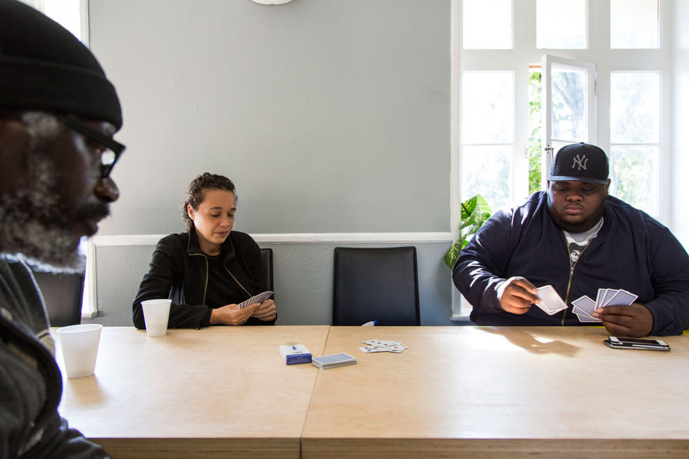Staff and service users playing cards