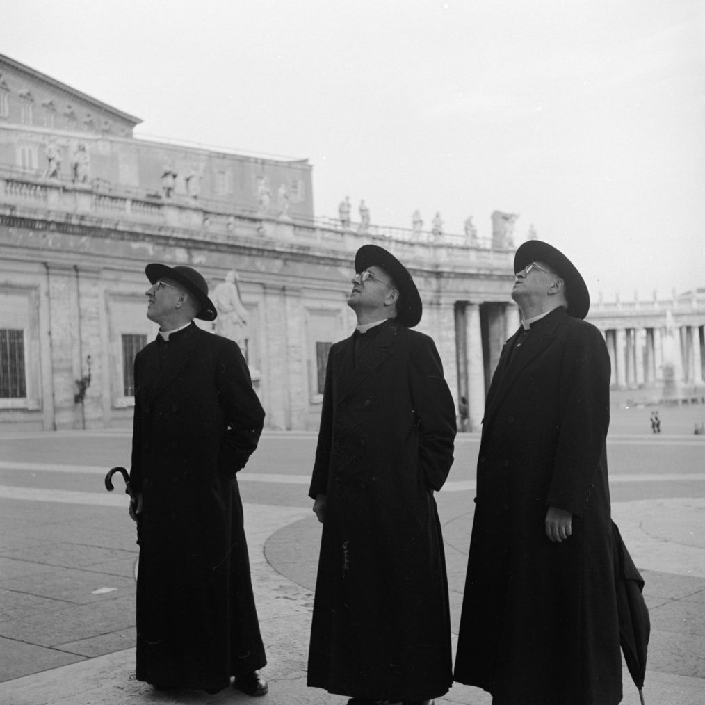 Three priests during a visit to Vatican City. Circa 1955.