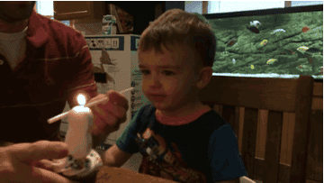 This 2 Year Old Trying To Blow Out His Birthday Candle Is Heartbreakingly Cute