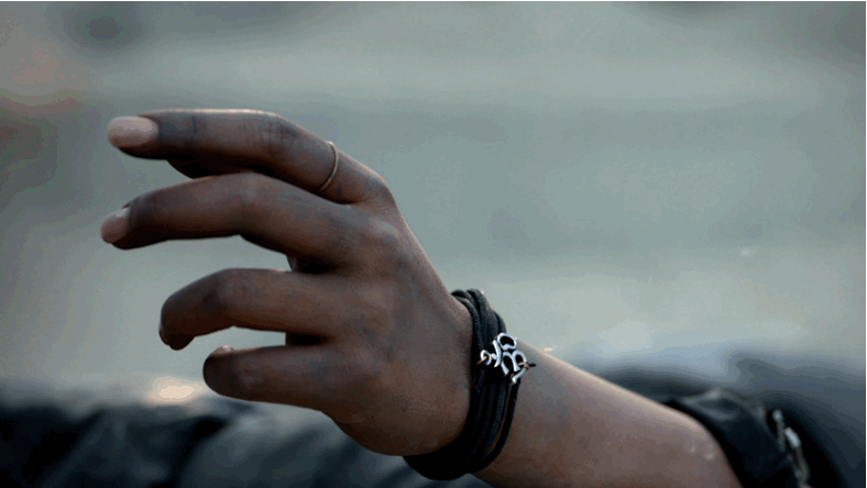 Chopra and her om bracelet in the Quantico pilot.