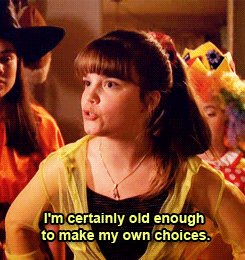 See through yellow top over a black cami, paired with a serious attitude.Oh, and a scrunchie, obvs.