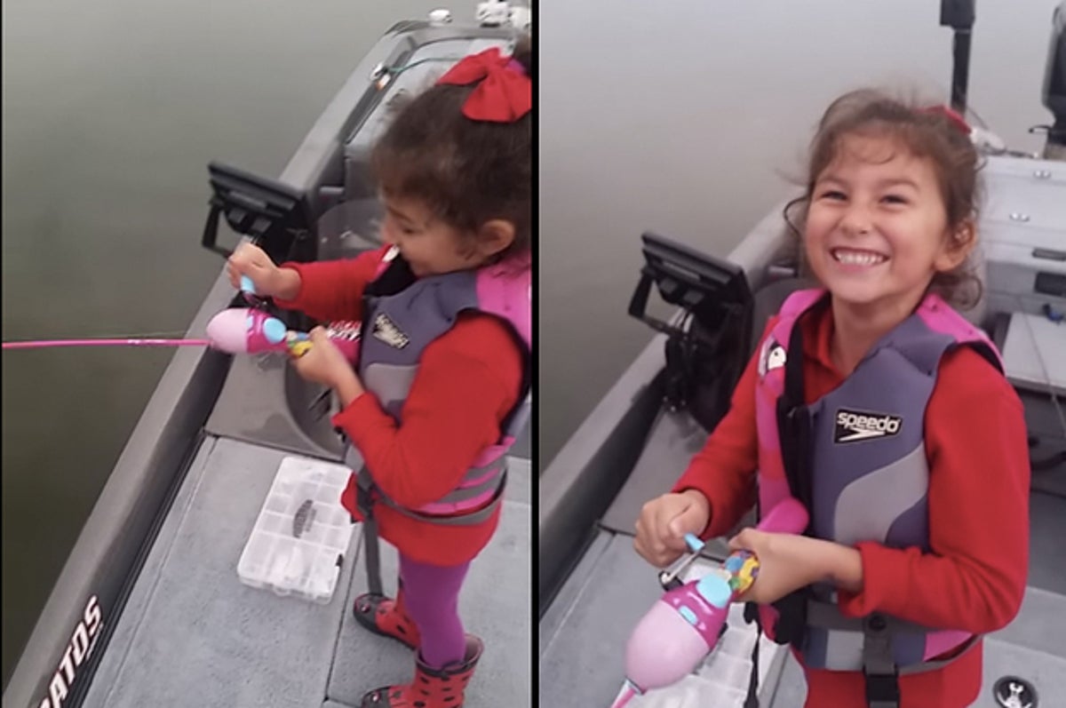 Little girl catches big fish with Barbie fishing pole