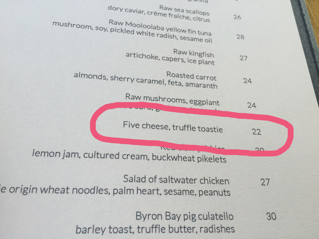 The $22 sandwich contains five different kinds of cheese – each from impressive locations, according to the chef who was grilling them up in front of us. It's also served with truffles – go figure.Two of the cheeses were from Tasmania, and according to the chef they "smelled really bad, but we are working on it." Working on it? How? Do they have a machine that makes cheese not smelly?