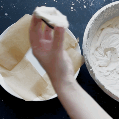 When you have completed a circle of cookies, start stacking another layer on top of the first one.