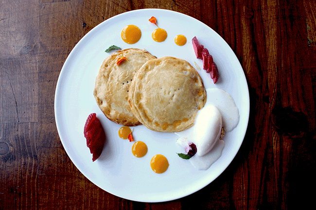 Coyota from Sirena in Little Italy is a unique dessert consisting of Mexican pastry, piloncillo (an unrefined sugar), vanilla ice cream, strawberry, and mango. It is best described in one word: "deliciousness."